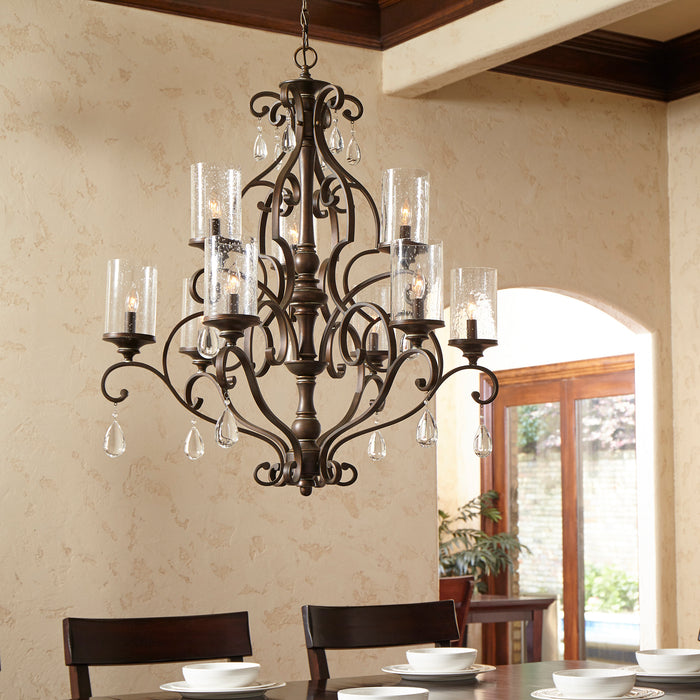 A traditional style 2-Tier Chandelier in bronze finish with crystal accents.