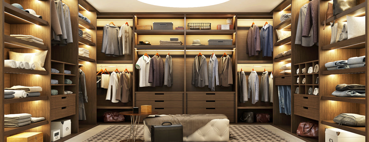 Walk-in closet showcasing shelves with LED lighting.