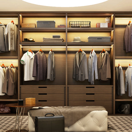 Walk-in closet showcasing shelves with LED lighting.