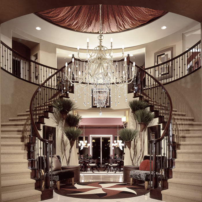 Elegant crystal chandelier showcased in a grand foyer.