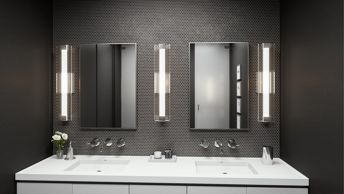 Linear vanity lights showcased in a modern style bathroom.