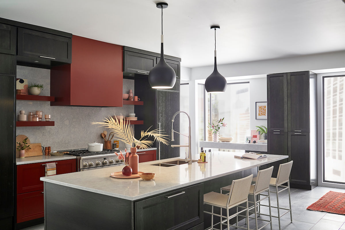 Modern style kitchen showcasing two downlight pendant lights above a kitchen island.