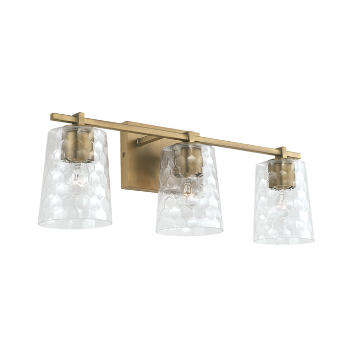 Burke Three Light Vanity in Aged Brass