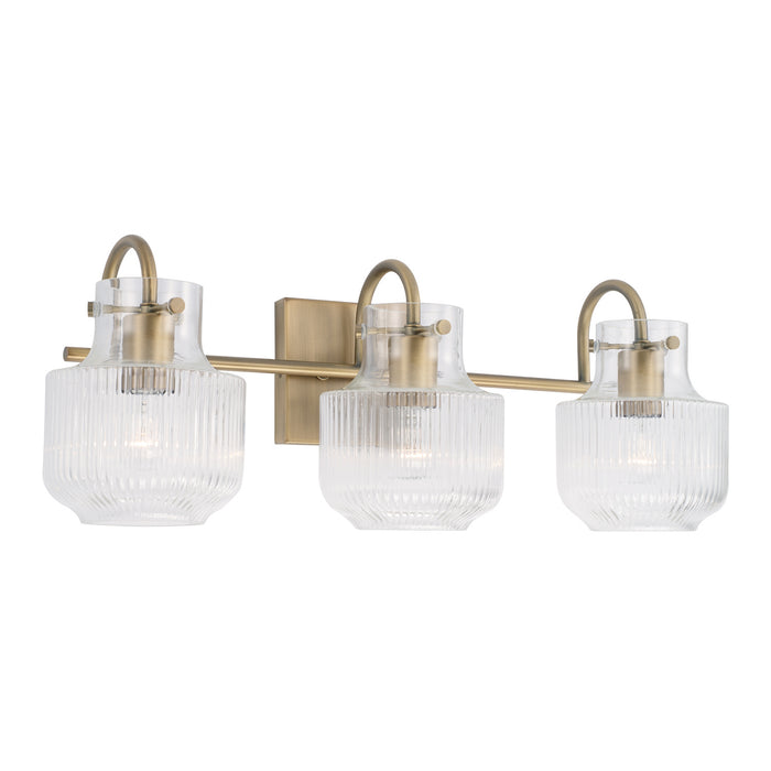 Nyla Three Light Vanity in Aged Brass