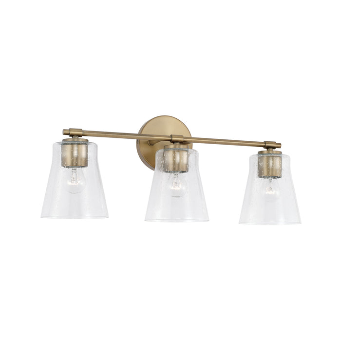 Baker Three Light Vanity in Aged Brass