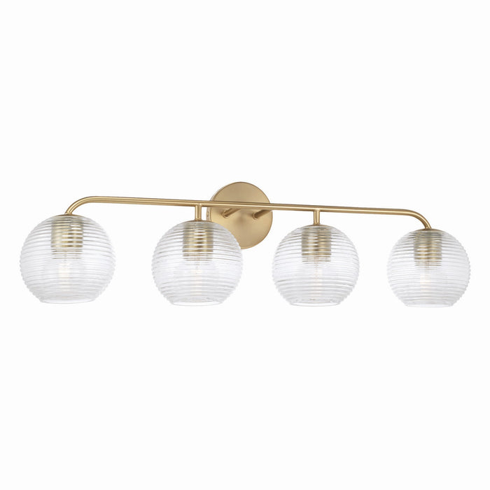 Dolan Four Light Vanity in Matte Brass