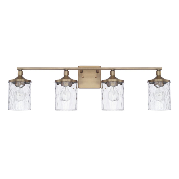 Colton Four Light Vanity in Aged Brass